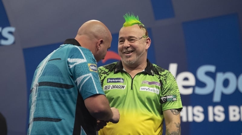 Wright shares a joke with Cross