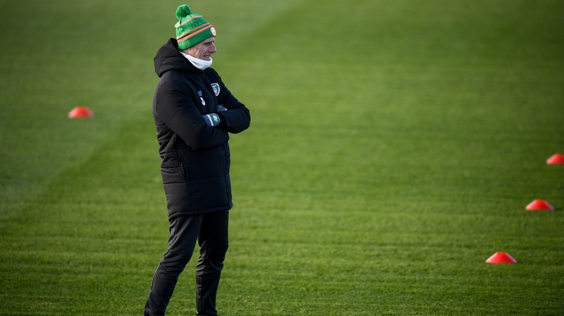 Mick McCarthy looks on as his squad train the day before 'the big game'