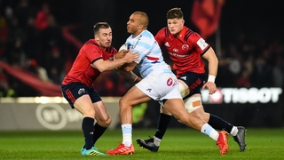 Racing 92 full-back Simon Zebo is tackled by JJ Hanrahan