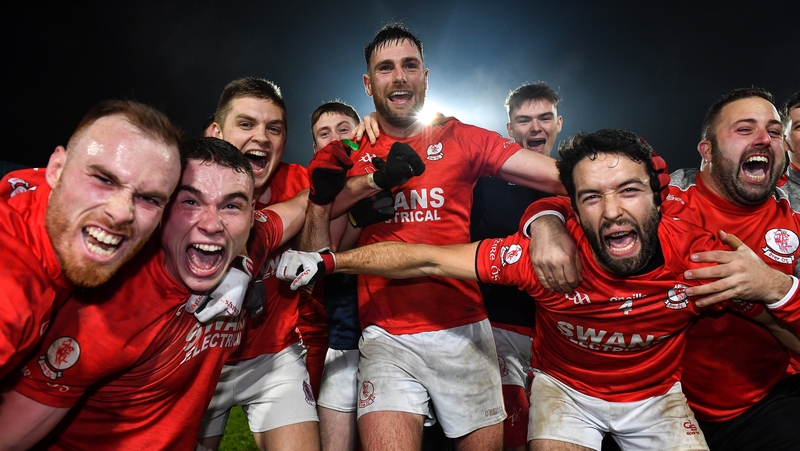Éire Óg players celebrate their victory over Portlaoise