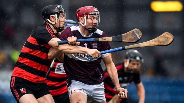Niall Kenny of Boris-Ileigh is tackled by Philip Mahony of Ballygunner