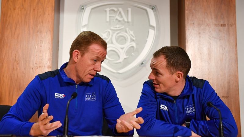 PFA Ireland General Secretary Stephen McGuinness (L) with Derek Pender