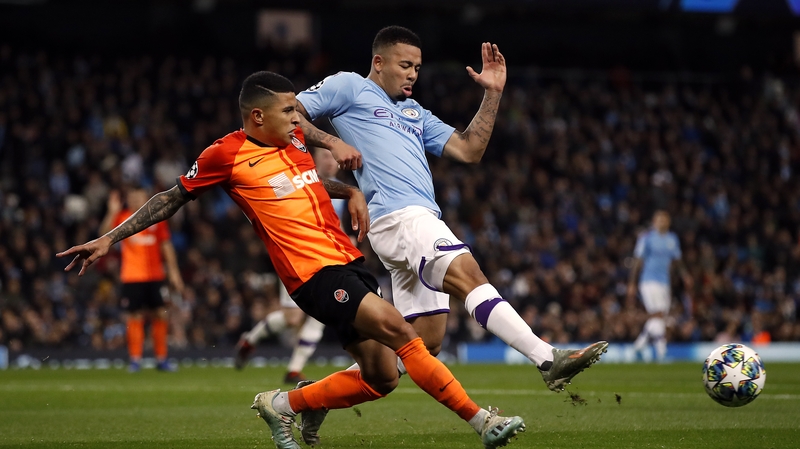 Manchester City's Gabriel Jesus (R) and Shakhtar Donetsk's Dodo Dos Santos battle for the ball