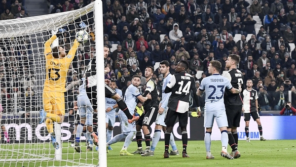 Paulo Dybala of Juventus scores from a near impossible angle