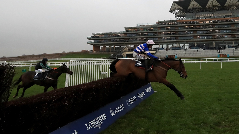 Cyrname leads Altior over the final fence at Ascot
