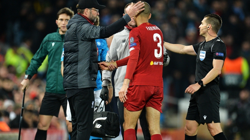 Jurgen Klopp consoles the stricken Fabinho at Anfield