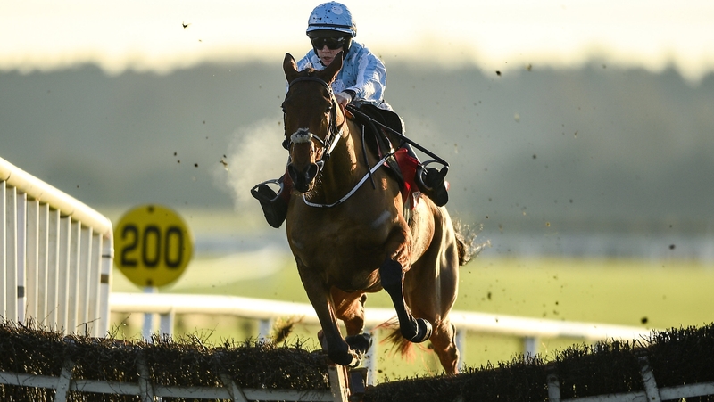 Honeysuckle, with Rachael Blackmore up, jumps the last before winning the Hatton's Grace Hurdle