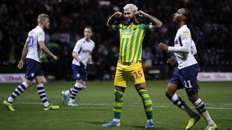 Charlie Austin celebrates his match-winning penalty against West Brom
