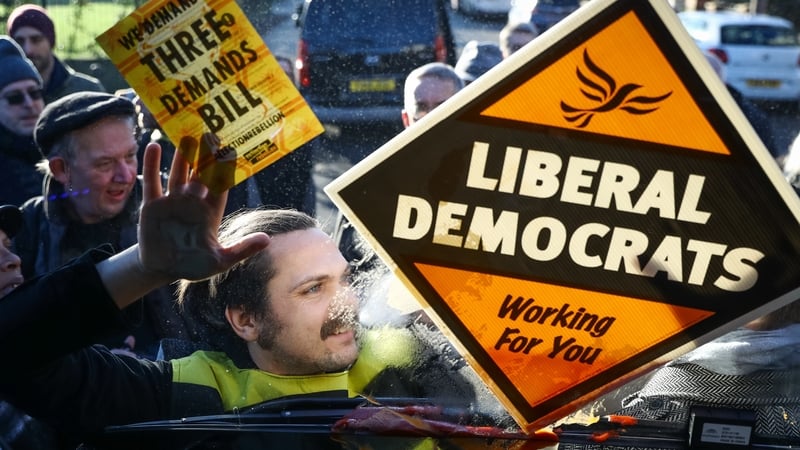 Extinction Rebellion activists targeted the Lib Dems' electric bus