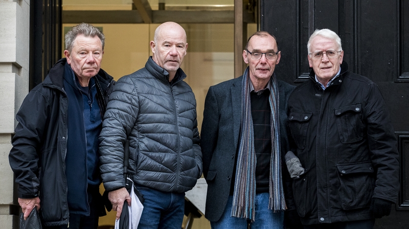 Joe McKinney, John McKinney, Liam Wray, and John Kelly (L-R) on the steps of Derry courthouse before the Soldier F mention hearing