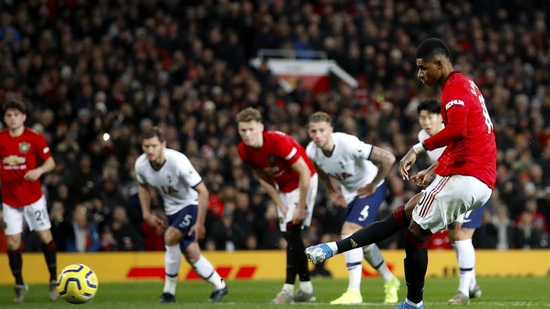 Marcus Rashford scores from the penalty spot