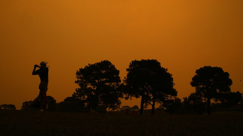 Adam Scott plays a fairway shot on the 18th hole at the Australian Golf Club