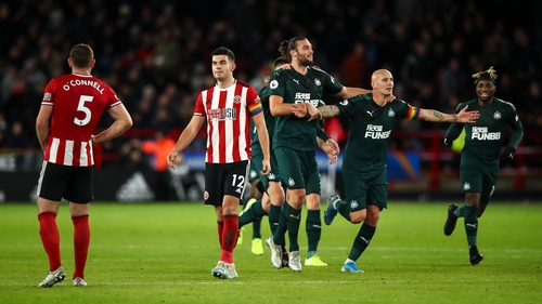 Jonjo Shelvey (2nd from R) and Andy Carroll celebrate