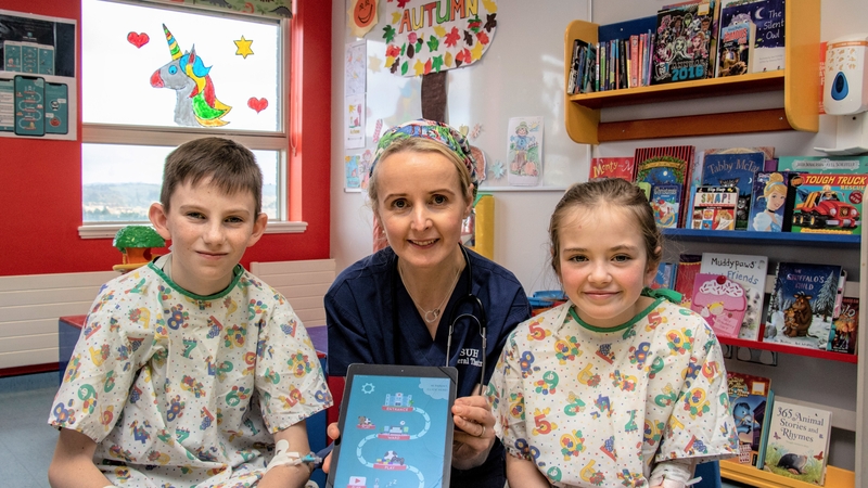 Dr Anne Dolan with Hugh Gannon from Sandyhill and Ellie Langan from Grange