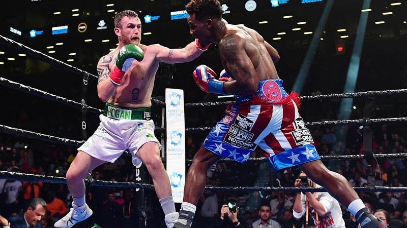 Dennis Hogan leads with the left during the world title bout in New York