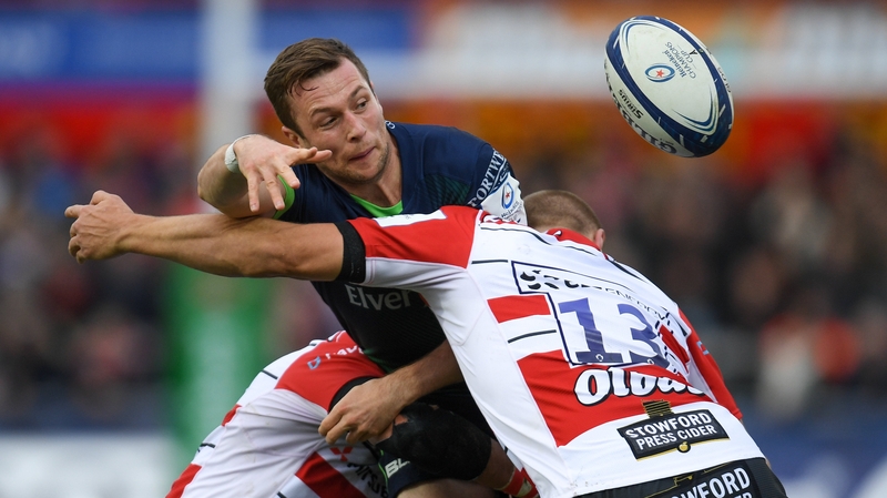 Connacht's Jack Carty is tacjkled by Franco Mostert, left, and Chris Harris of Gloucester