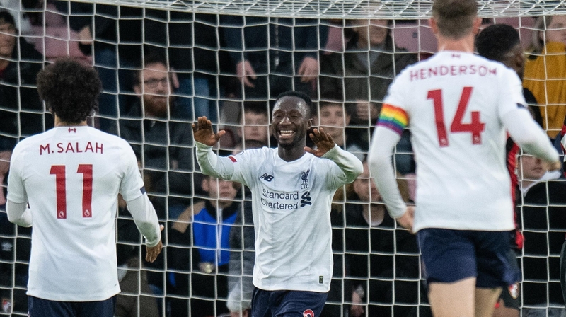 Naby Keita celebrates with his team-mates