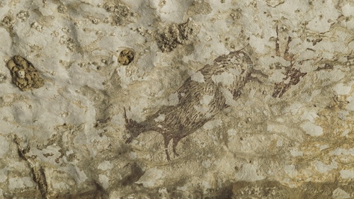 The painting depicts wild animals being chased by half-human hunters (All images courtesy of Griffith University)