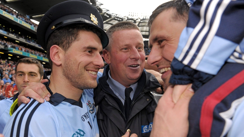 Paul Caffrey (C) joins in the celebrations in 2011 after Dublin's All-Ireland success