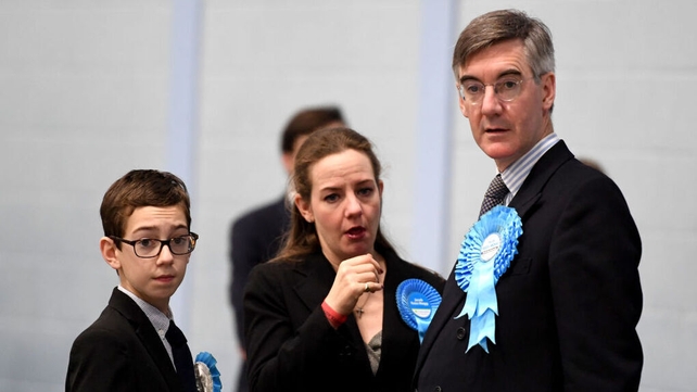 Conservative Party candidate Jacob Rees-Mogg, wife Helena and son Peter arrive at a election count in Bath