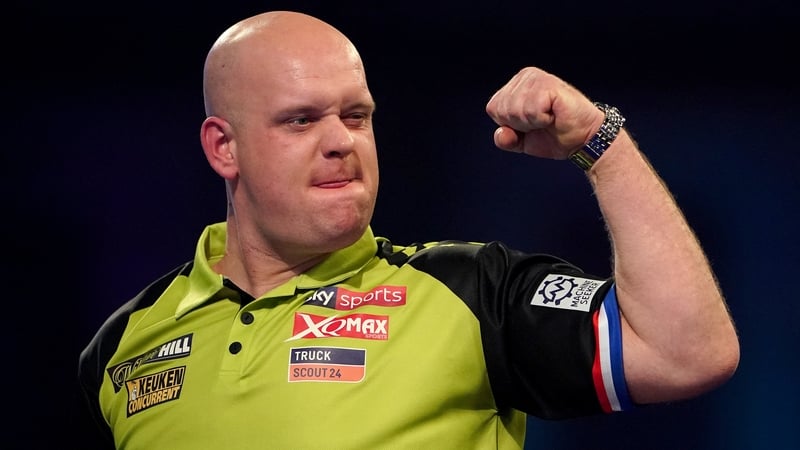 Michael van Gerwen celebrates after beating Jelle Klaasen