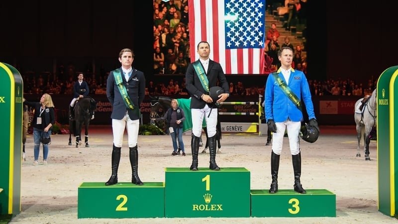 Darragh Kenny stands second on the podium in Geneva