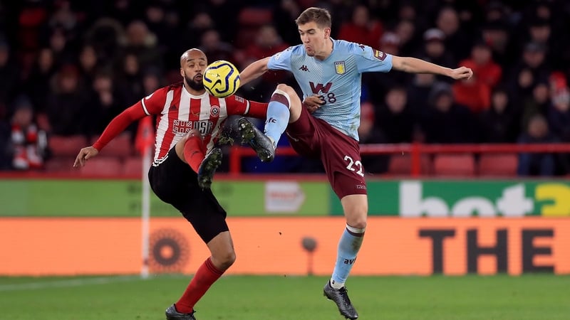 Aston Villa's Bjorn Engels (right) and Sheffield United's David McGoldrick