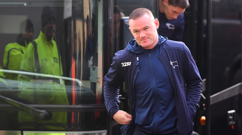Wayne Rooney departs the coach at Derby County ahead of their game against Millwall