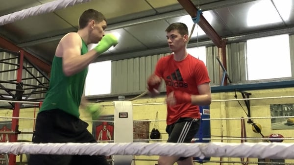 Stevie and Aaron McKenna going through their training routine in the family gym in Smithborough