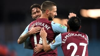 Conor Hourihane is congratulated by his team-mates after opening the scoring