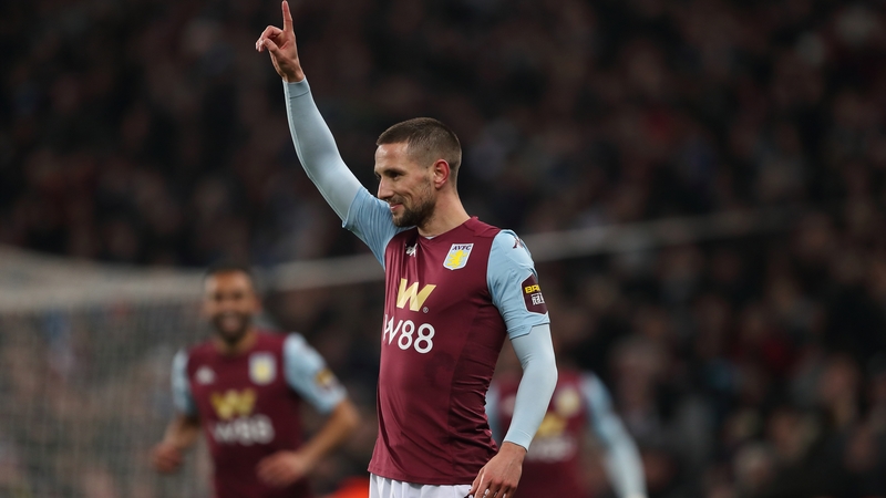 Conor Hourihane celebrates with a sheepish grin after his free-kick ends up in the Liverpool net