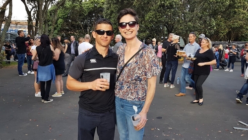 Fiona with husband James at the U2 concert in Auckland in November. The band gave a moving rendition of the song 'One' dedicated to the victims of the massacre