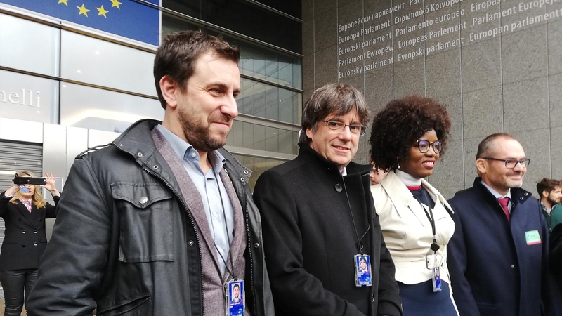 Former Catalan regional president Carles Puigdemont (right) and his health minister Toni Comin (left)