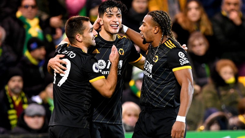 Raul Jimenez receives the congratulations of his team-mates