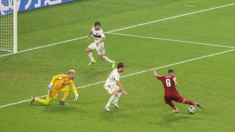 Roberto Firmino scores the only goal of the game in the Qatari capital