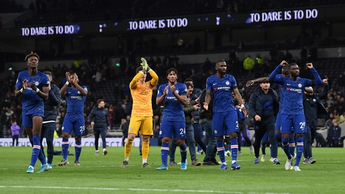 Chelsea players salute their fans after their 2-0 win at Tottenham