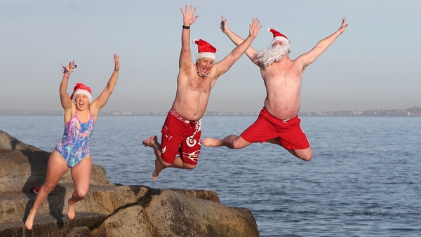 People take part in the annual Christmas Day swim at the Forty Foot in Dublin