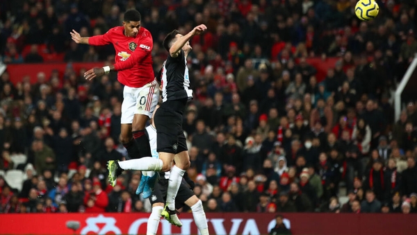 Marcus Rashford leaps highest to score Manchester United's third goal at Old Trafford