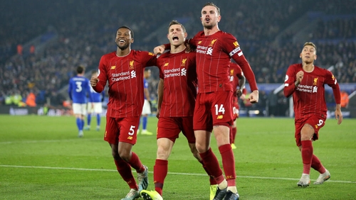 James Milner celebrates his penalty with Liverpool team-mates