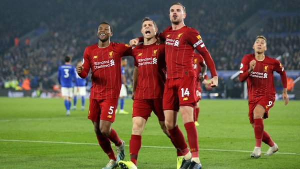 James Milner celebrates his penalty with Liverpool team-mates