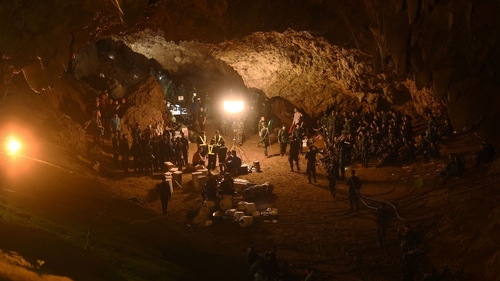 Thai soldiers relay electric cable deep into the Tham Luang cave in June 2018