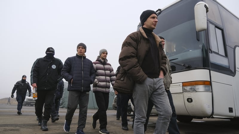 Prisoners walk before a prisoner exchange between Ukrainian and pro-Russian rebels' sides