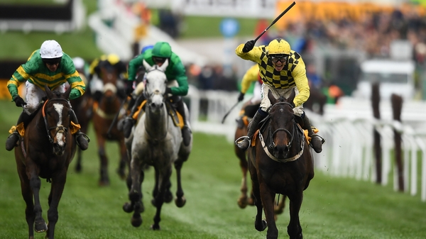Paul Townend celebrates on Al Boum Photo after winning the the 2019 Cheltenham Gold Cup
