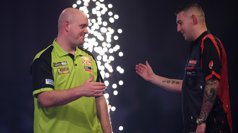 Michael van Gerwen shakes hands with Nathan Aspinall after his semi-final victory