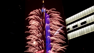 Fireworks and light effects illuminate the night sky from the Taipei 101 skyscraper