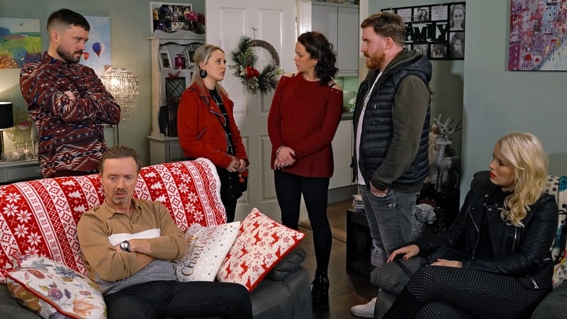 Erica's forced to come clean in front of the Collins clan