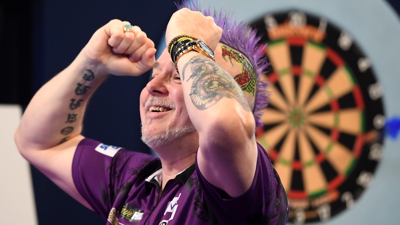 Peter Wright reacts to his win over Michael van Gerwen