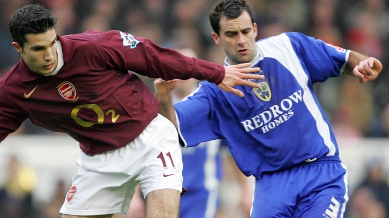Chris Barker (R) in action for Cardiff City against Robin van Persie in an FA Cup clash back in 2006