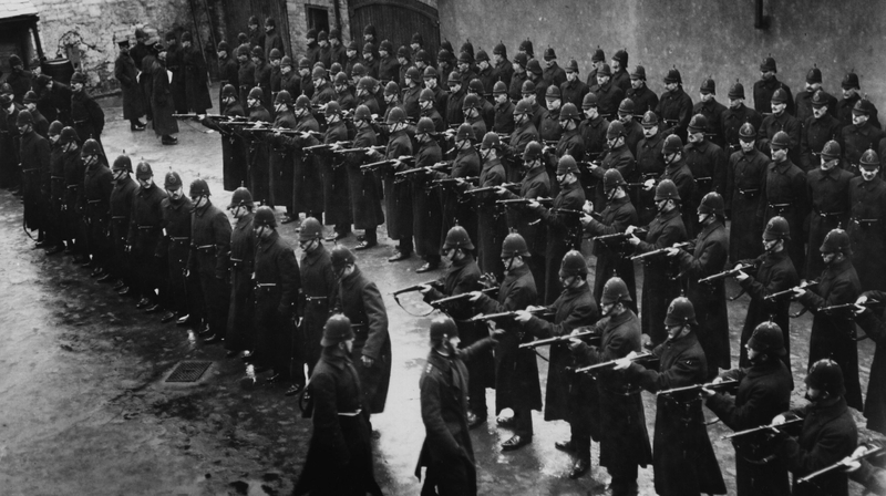 Royal Irish Constabulary members under inspection during a by-election in Derry (Pic: Hulton Archive/Getty Images)