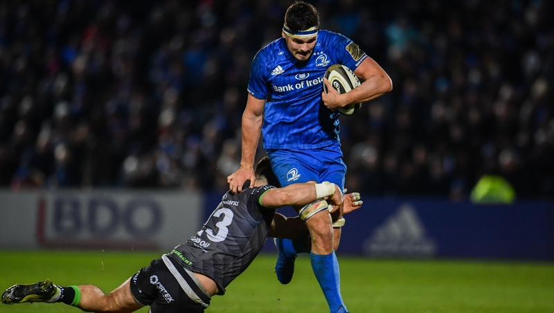 Max Deegan breaks through the tackle of Tiernan O'Halloran